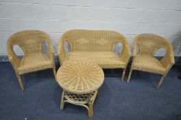 A WICKER FOUR PIECE CONSERVATORY SUITE, comprising a sofa, pair of armchairs and a circular