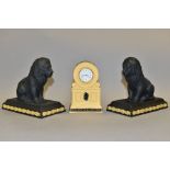 THREE WEDGWOOD JASPERWARE LIBRARY COLLECTION ITEMS, comprising a pair of black basalt seated lion