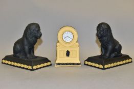 THREE WEDGWOOD JASPERWARE LIBRARY COLLECTION ITEMS, comprising a pair of black basalt seated lion