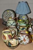 GLYN COLLEDGE (1922-2000) A COLLECTION OF HAND PAINTED CERAMICS, to include two tankards, five water