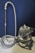 A NILFISK GM80P retro vacuum cleaner (PAT fail due to taped cable but in full working order)