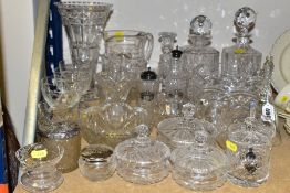 THIRTY PIECES OF CUT GLASS AND CRYSTAL, to include a pot with distressed embossed silver lid,