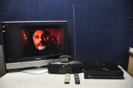 A PANASONIC TX32LXD52 32in tv with a Panasonic DMR-EZ49V vhs/DVD recorder and a Philips AQ5055/05