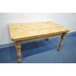 A PINE KITCHEN TABLE, on turned legs, length 153cm x depth 90cm x height 80cm