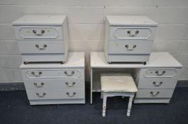 A WHITE SIX PIECE BEDROOM SUITE, comprising a dressing table with triple mirror, stool, chest of
