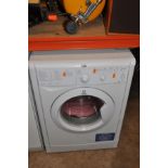 AN INDESIT IWB5113 WASHING MACHINE ( PAT pass and powers up)