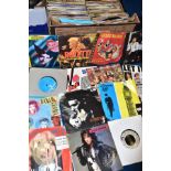 A BOX OF APPROXIMATELY FOUR HUNDRED VINYL SINGLES, most have sleeves, artists to include The Rolling