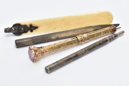 A RETRACTABLE DUEL PEN AND PENCIL AND TWO OTHERS, a yellow metal hexagonal duel pen and pencil