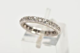 A WHITE METAL DIAMOND FULL ETERNITY RING, set with single cut diamonds, each interspaced with