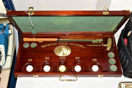 GOLF, a Davenport & Sullivan Golf Classic Pro Am 1998 Improve Your Putting Set, in a mahogany case