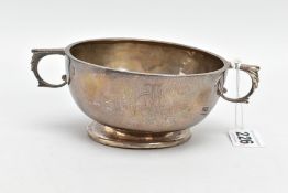 A SILVER PORRIDGER, plain polished design with an engraved monogram, fitted with double handles on a