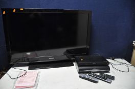 A TOSHIBA 40BV702B 40in tv along with a Philips DVD player not reading disc and a SKY plus HD box (
