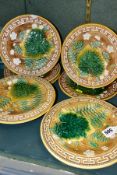 A SEVEN PIECE VICTORIAN MAJOLICA DESSERT SET, comprising a pair of comports and five dessert plates,