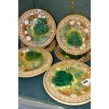 A SEVEN PIECE VICTORIAN MAJOLICA DESSERT SET, comprising a pair of comports and five dessert plates,