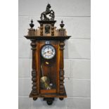 A LATE VICTORIAN GUSTAV BECKER WALNUT VIENNA WALL CLOCK, with ceramic horse pediment, winding key