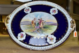 A ROYAL VIENNA PORCELAIN OVAL TRAY, depicting a scene of three ladies and cupid in a landscape