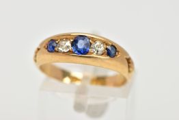 A LATE 19TH CENTURY SAPPHIRE AND DIAMOND RING, designed with three circular cut blue sapphires,