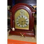 AN EARLY 20TH CENTURY MAHOGANY CASED BRACKET CLOCK, arched pediment on Doric columns flanking the