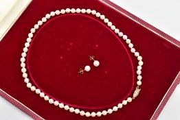 A CULTURED PEARL NECKLACE AND MATCHING EARRING SET, a string of sixty-three cultured pearls,