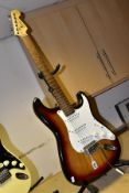 A SQUIER AFFINITY STRATOCASTER in tobacco Sunburst with scratchplate and pickup covers, rosewood