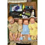 A BOX OF GOLF ACCESSORIES AND FOUR VINTAGE DOLLS to include a Gary Player Putt Returner, corrosion