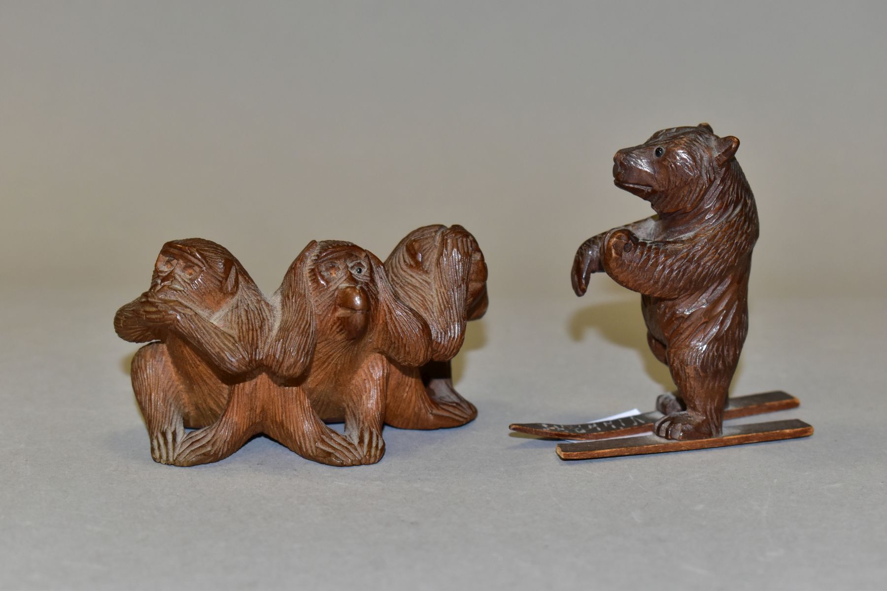 AN EARLY 20TH CENTURY CARVED TREEN BLACK FOREST BEAR ON SKIS, height 6.5cm, s.d., a Japanese - Image 4 of 11