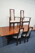 A ROSEWOOD EFFECT DANISH/SWEDISH STYLE EXTENDING DINING TABLE, on twin V shaped legs, with a