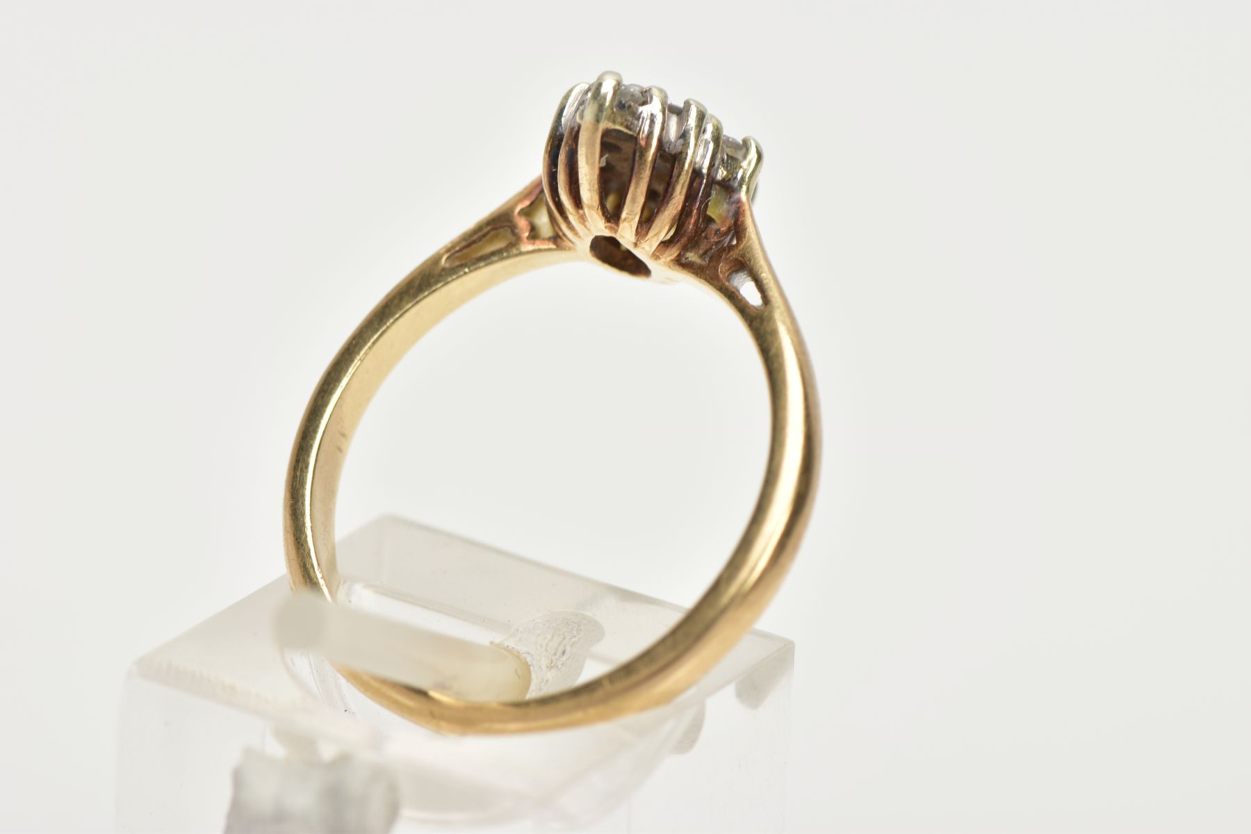 A 9CT GOLD DIAMOND RING, designed with a lozenge shape cluster of claw set, round brilliant cut - Image 3 of 4