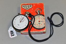 A CLOCKWORK HEUER STOPWATCH IN ORIGINAL BOX, with two tone case, white dial, black Arabic numerals