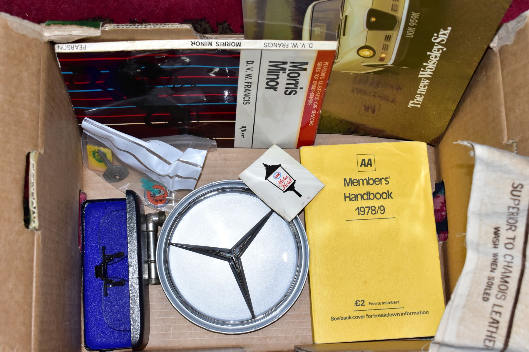 A BOX OF MOTORING ITEMS, to include an Austin 1800 workshop manual, Wolseley Six brochure, car - Image 4 of 4