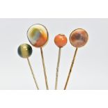 FOUR GEM SET STICKPINS, four pins, two set with operculum, one set with an orange opaque stone and