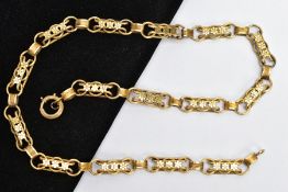 A VICTORIAN GOLD CHAIN, a fancy link chain with a repeating floral pattern, fitted with a textured