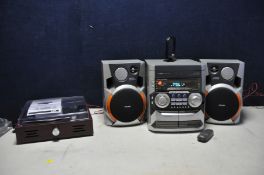 A PHILIPS FW.C355 MINI HI-FI SYSTEM with remote and original box (PAT pass and working) along with a