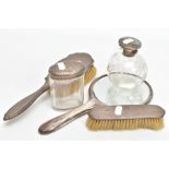 FIVE DRESSING TABLE ITEMS, to include a round glass scent bottle with an etched bow and foliate