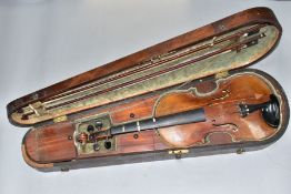 A LATE 19TH CENTURY MAHOGANY COFFIN VIOLIN CASE CONTAINING A VIOLIN AND TWO BOWS, the violin with