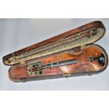 A LATE 19TH CENTURY MAHOGANY COFFIN VIOLIN CASE CONTAINING A VIOLIN AND TWO BOWS, the violin with