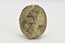 A LAVA CAMEO BROOCH, of oval outline carved in high relief to depict a female in profile with
