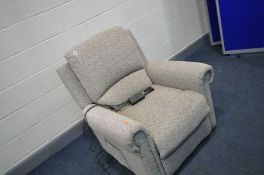 A BEIGE ELECTRIC RISE AND RECLINE ARMCHAIR with power supply and remote but no power cable (PAT fail