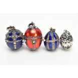 FOUR WHITE METAL AND ENAMEL EGG PENDANTS, to include a white metal openwork egg fitted with a