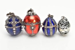 FOUR WHITE METAL AND ENAMEL EGG PENDANTS, to include a white metal openwork egg fitted with a