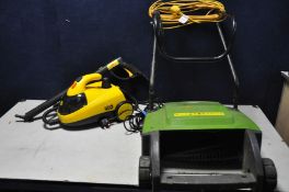 A LITTLE YELLO WJ528 STEAM CLEANER and a lawn rake (both PAT pass and working)