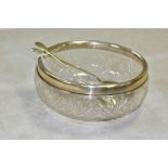 A GEORGE V SILVER RIMMED CUT GLASS SALAD BOWL, hallmarked for maker Docker & Burn Ltd, Birmingham