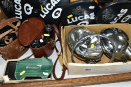 A PAIR OF VINTAGE LUCAS SLR700S DRIVING LIGHTS with four vinyl covers, together with a vintage