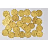 A PACKET OF 29 BRASS SPADE GUINEA (LOOKALIKE) TOKENS GENERALY USED AS MONEY DURING GEORGIAN AND