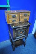 AN EARLY 20th CENTURY SMOKERS CUPBOARD with single door enclosing a fitted interior, over bobbin