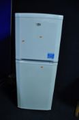 A BEKO CT5381APW FRIDGE FREEZER width 55cm depth 60cm height 1290cm (condition:- inside light not