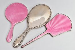 THREE SILVER VANITY MIRRORS, to include a round pink guilloche enamel mirror, hallmarked 'Henry