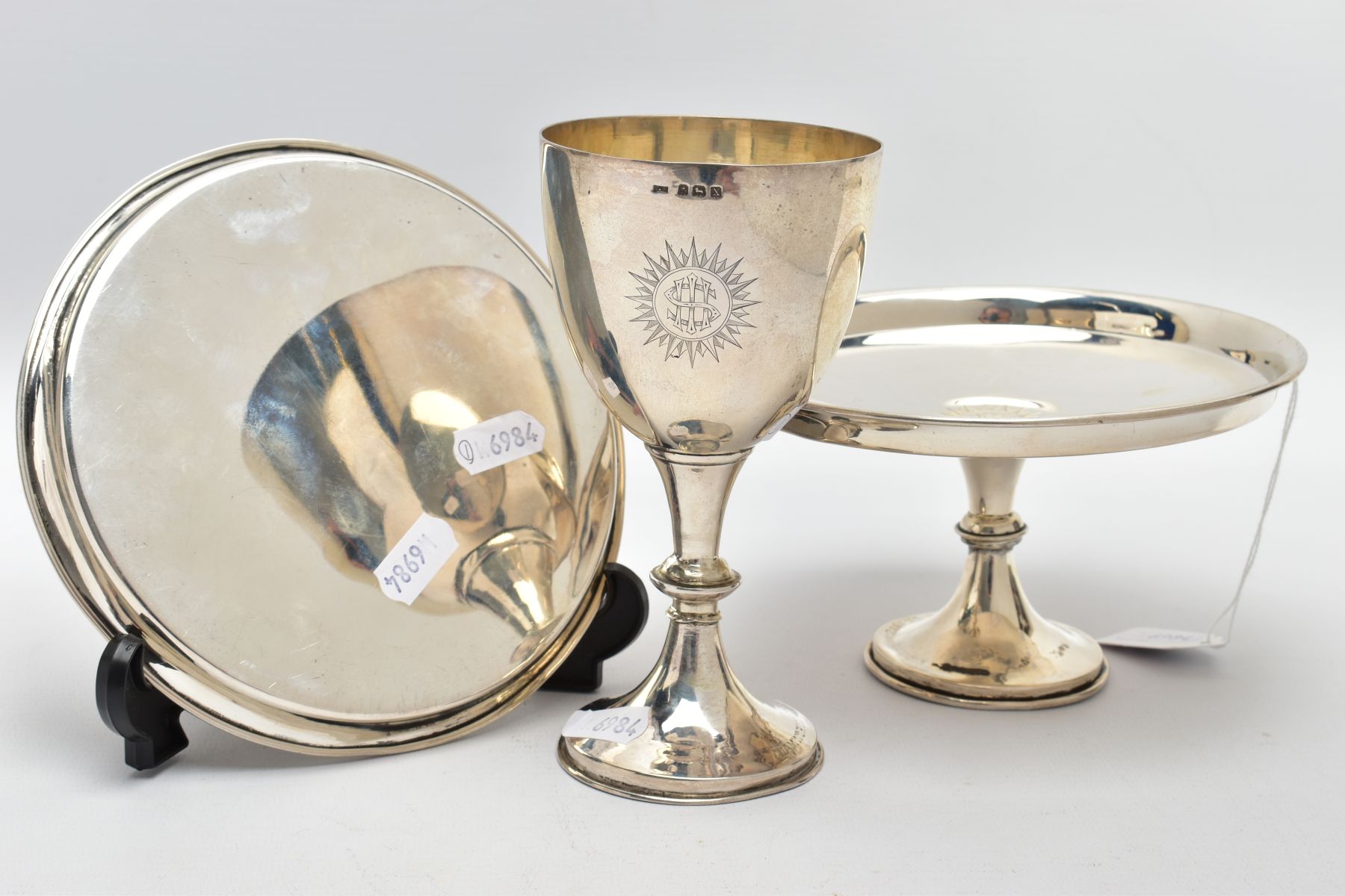 THREE SILVER ITEMS, to include a goblet of a plain polished design with an engraved motif, slight - Image 3 of 4