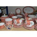 A FIFTY EIGHT PIECE VILLEROY & BOCH SIENA DINNER SERVICE, with a salmon pink, marble effect pattern,