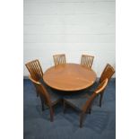 A TEAK DANISH SKOVBY DC06K CIRCULAR DINING TABLE, with an extending mechanism to reveal three pull